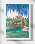 Kawase Hasui's Japanese Art Poster: Wisteria in full bloom in a serene Japanese garden